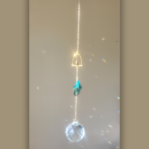 Chant Cristallin– Oiseau doré et plume