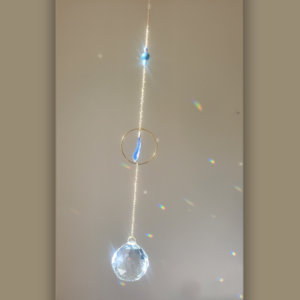 Attrape-soleil unique - Élégance suspendue